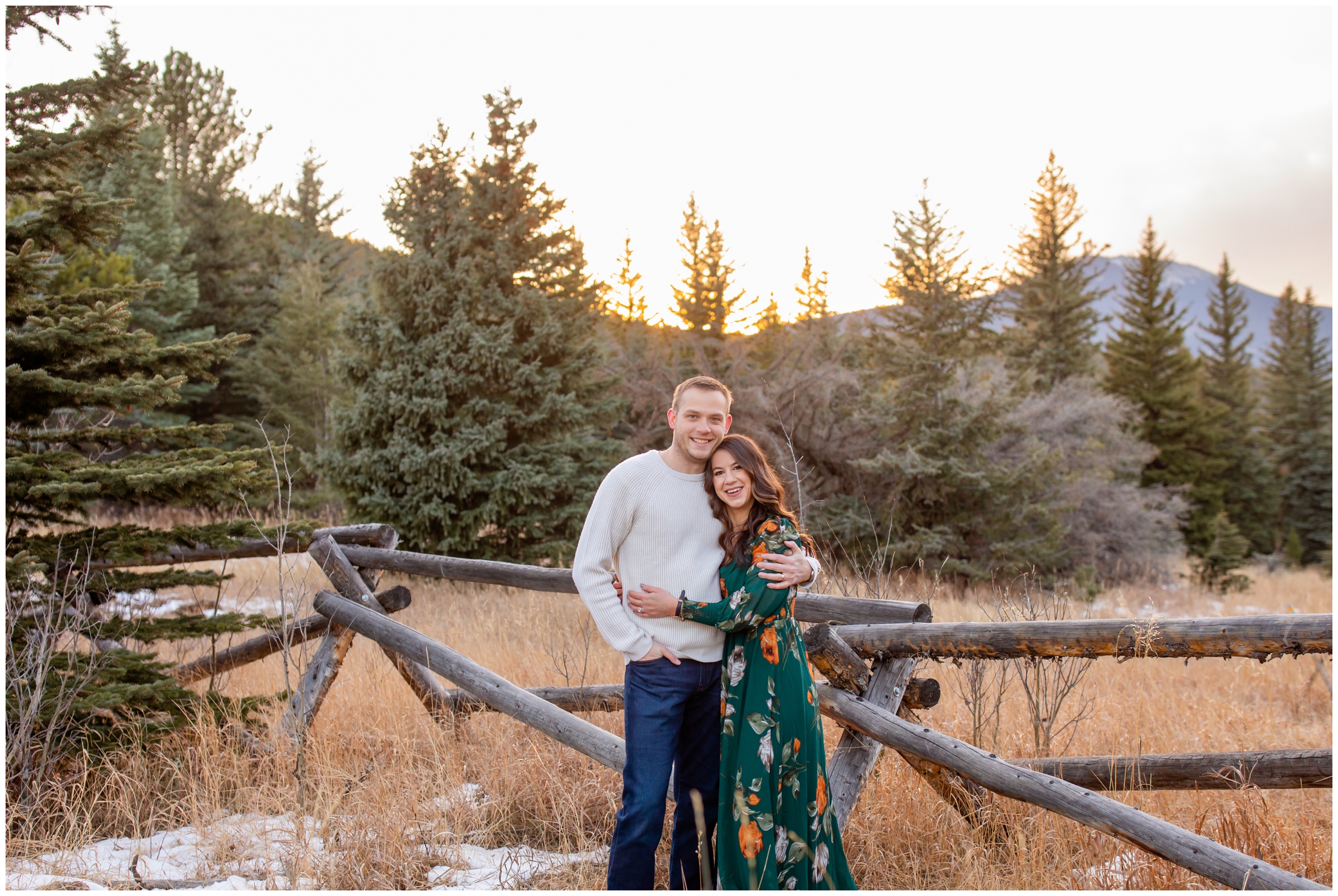 couple hugging at sunset in Evergreen Colorado during mountain anniversary couples photos