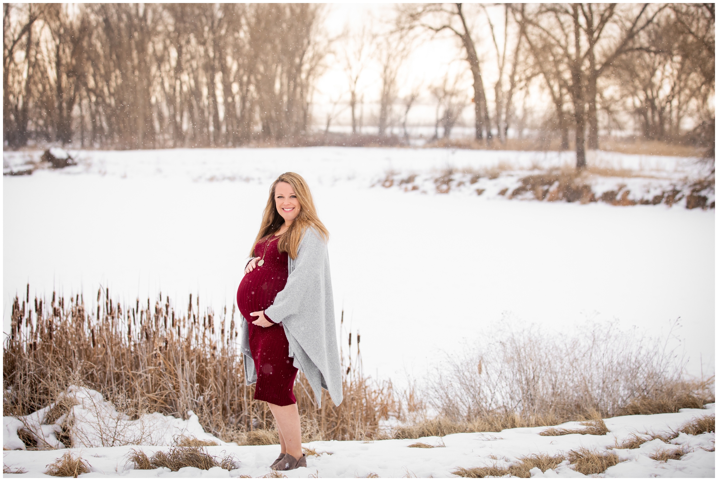 pregnant woman posing in the snow during Northern Colorado winter maternity portraits by Plum Pretty Photography
