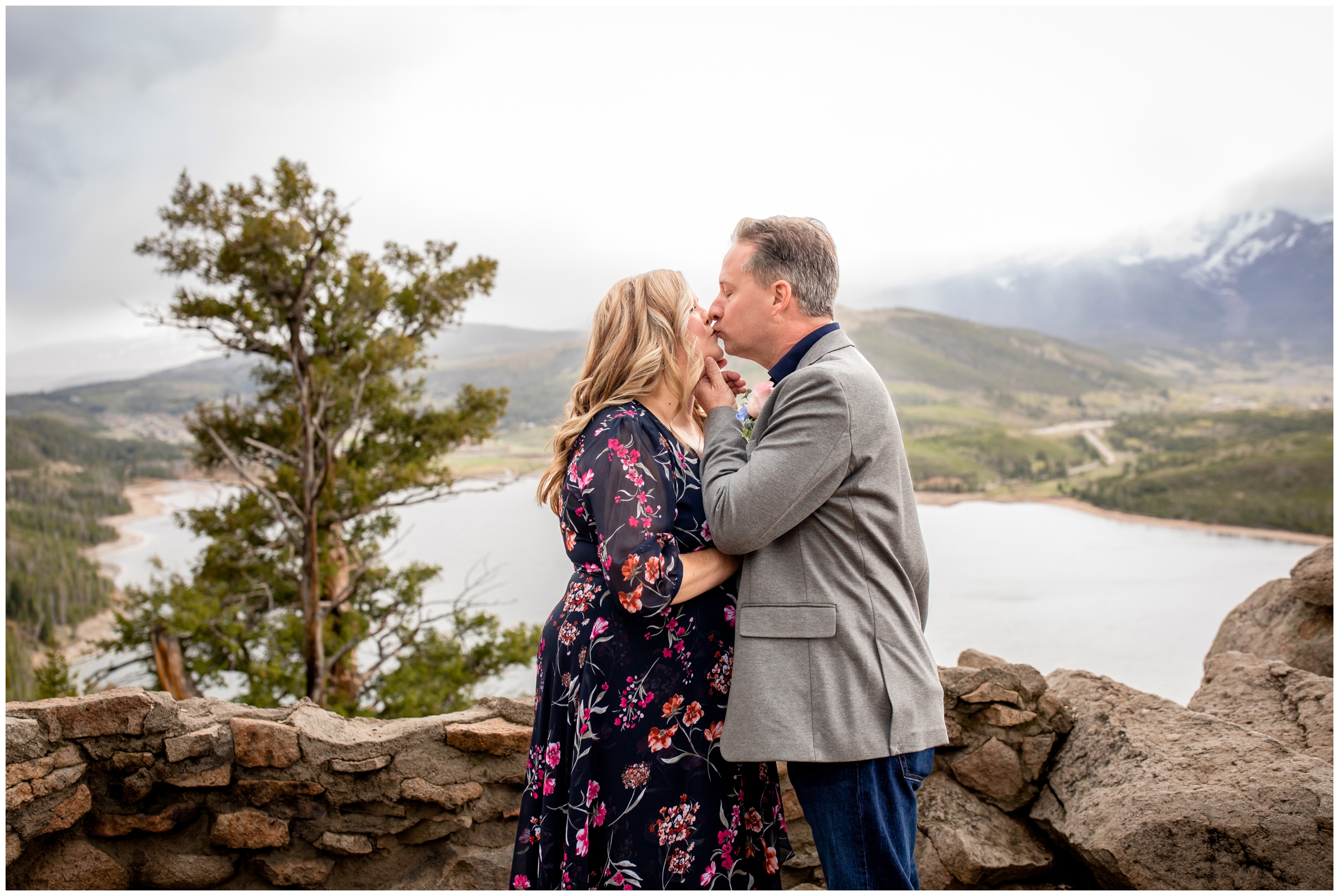 couple kissing during spring Breckenridge elopement pictures at Sapphire Point by Colorado wedding photographer Plum Pretty Photography