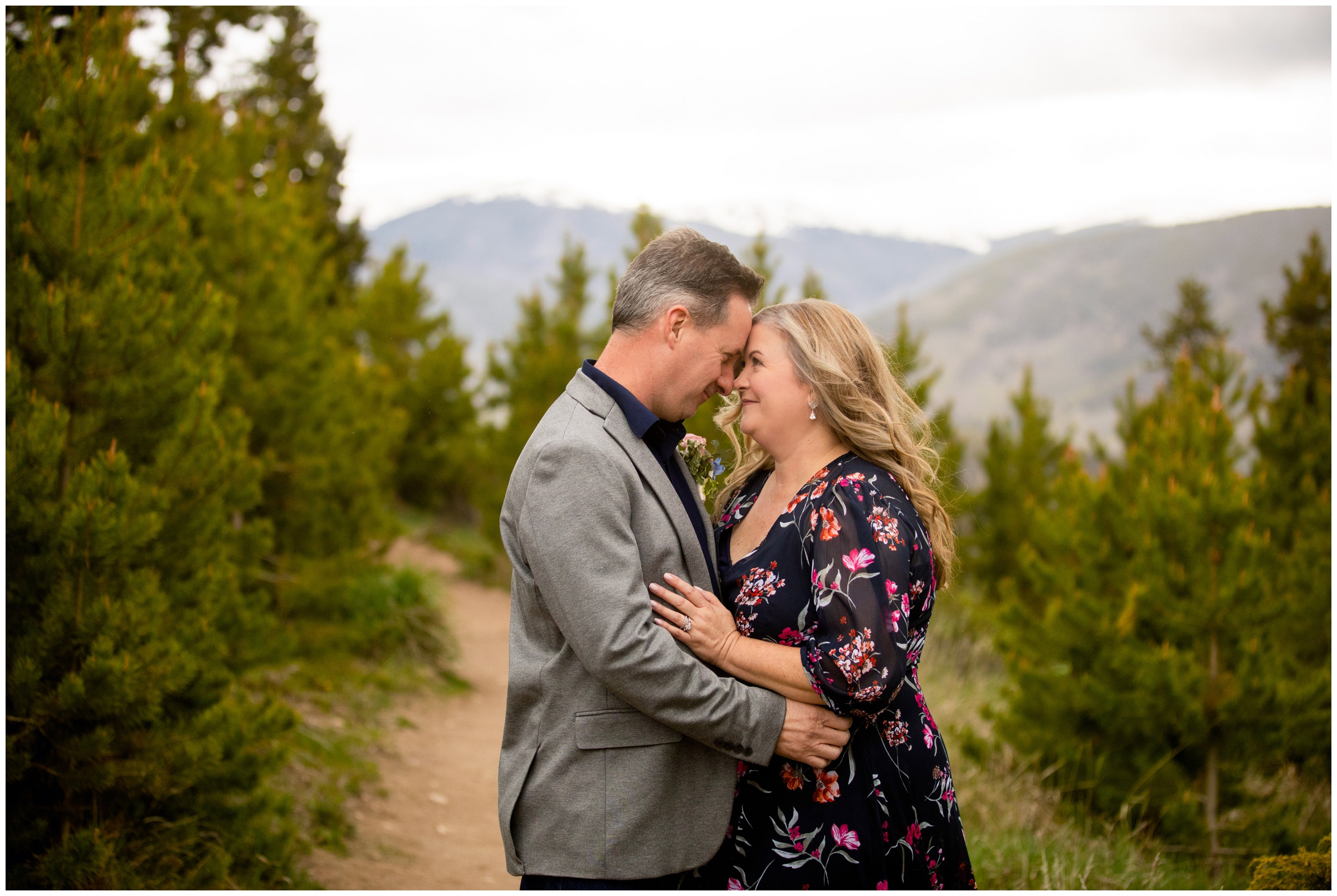 couple embracing during Breckenridge elopement pictures at Sapphire Point