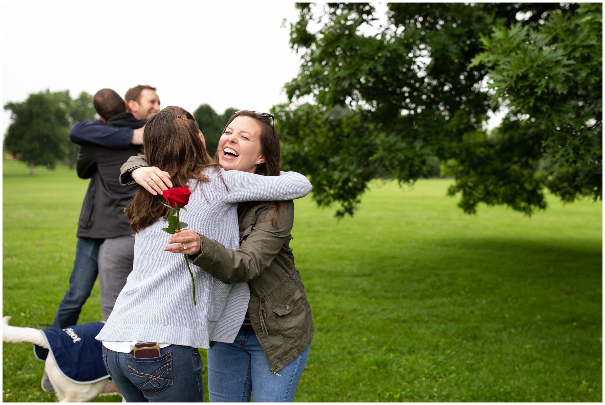 woman hugging her family after surprise proposal photo shoot in Denver Colorado 