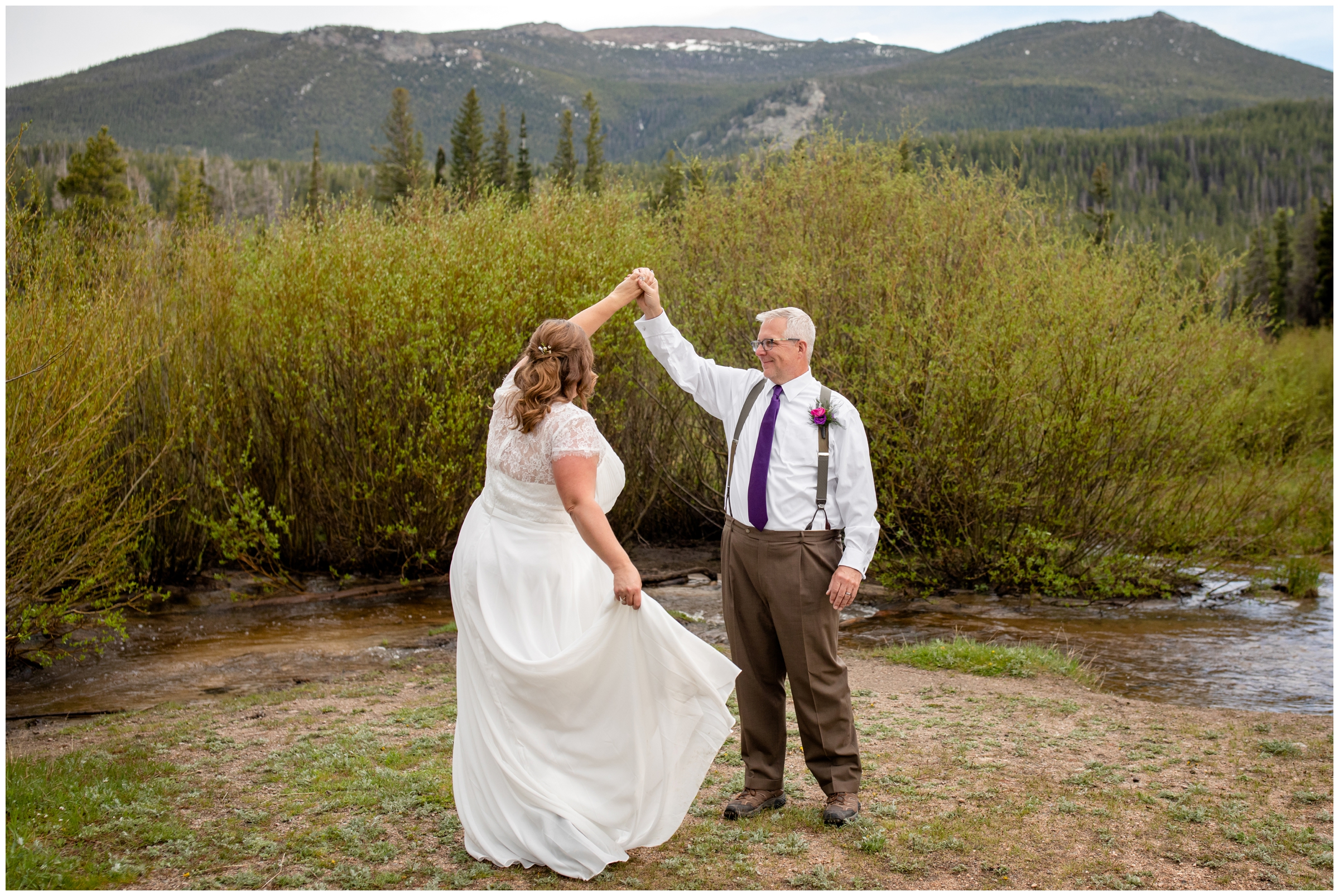 couple dancing with mountains in background during RMNP elopement photos at Sprague Lake