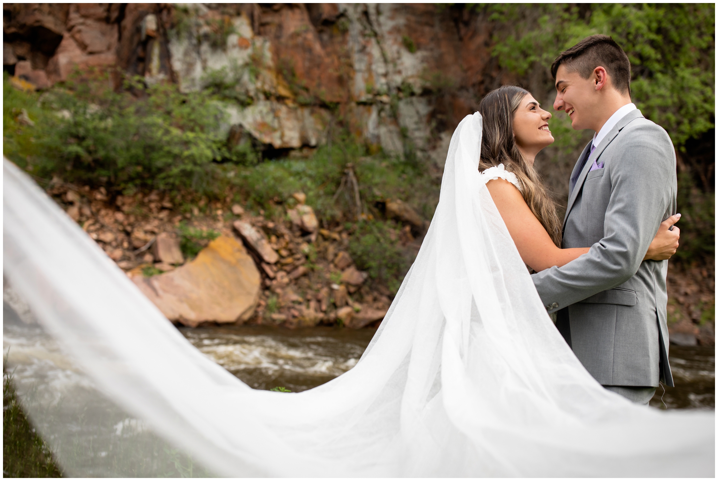 dramatic long veil photography inspiration at Lyons Farmette River Bend wedding 
