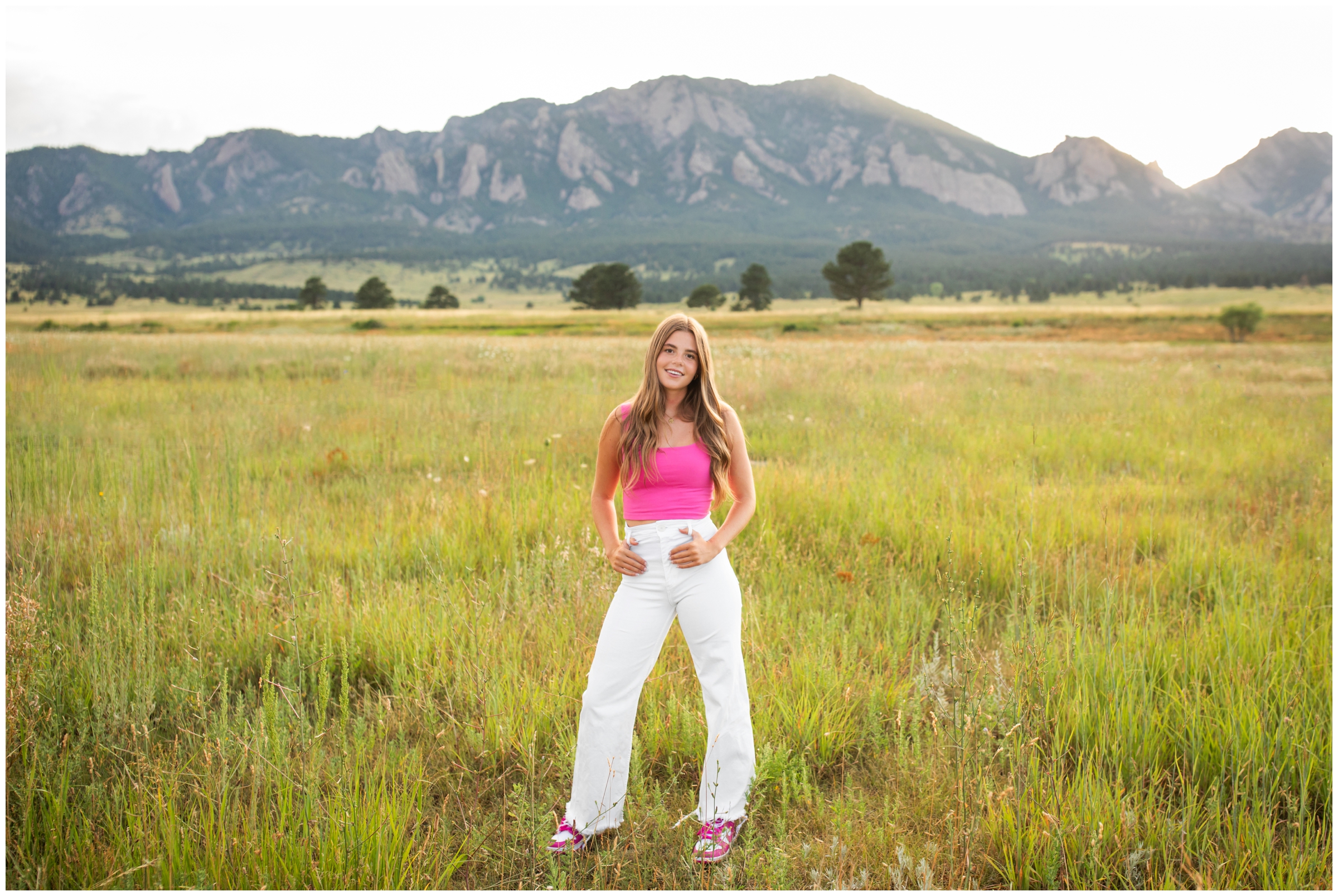 teen posing in mountain field during South Boulder Creek West senior photos by Plum Pretty photography