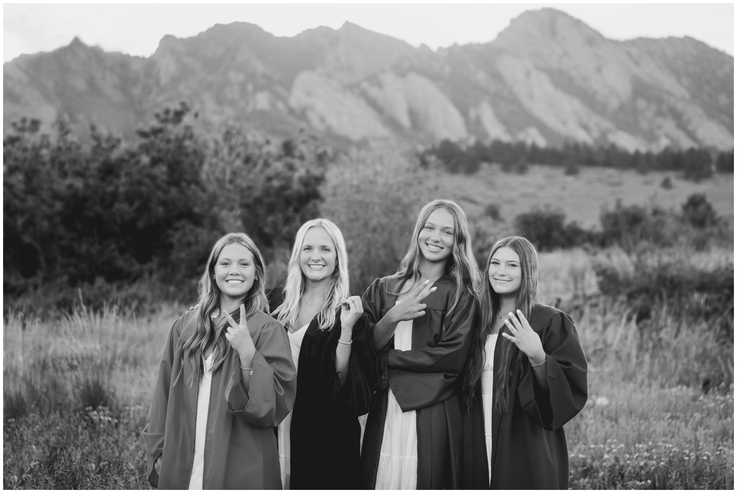 best friends Boulder Colorado graduation portraits with caps and gowns