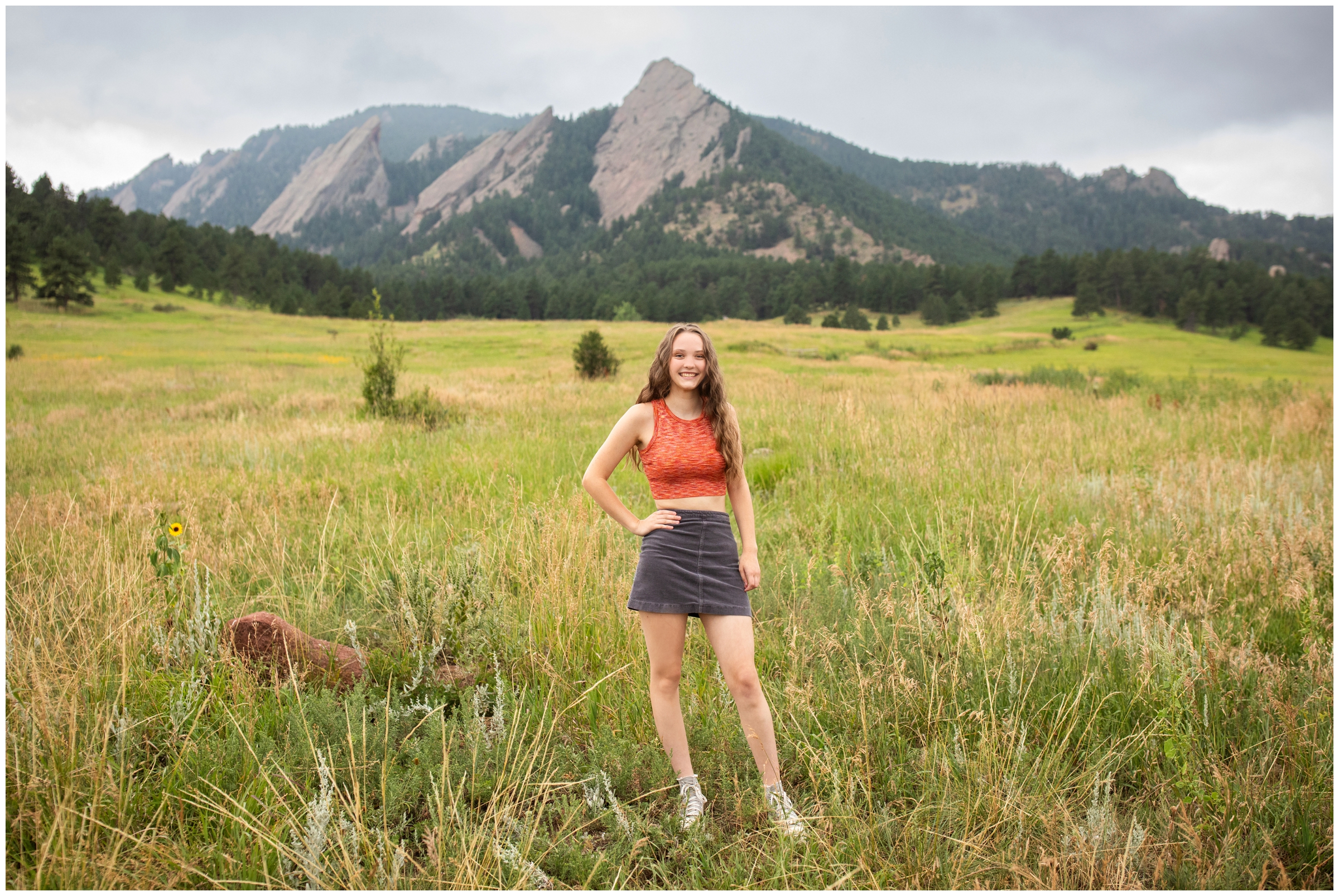 high school graduation photography session in front of the Colorado flatirons 