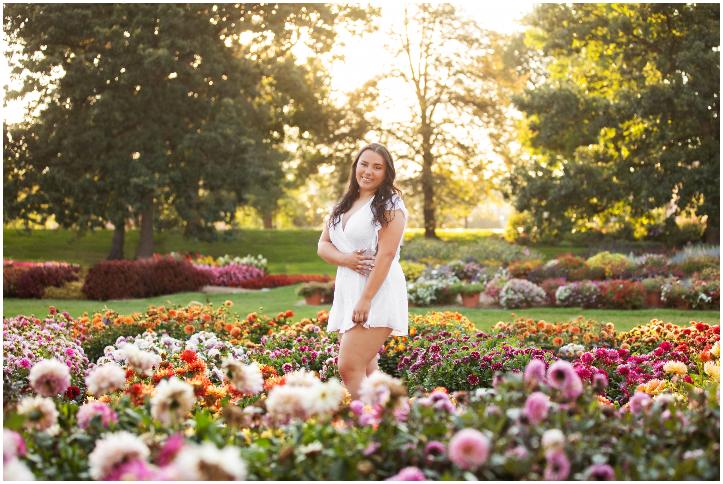 woman posing at CSU trial gardens during Fort Collins senior pictures 