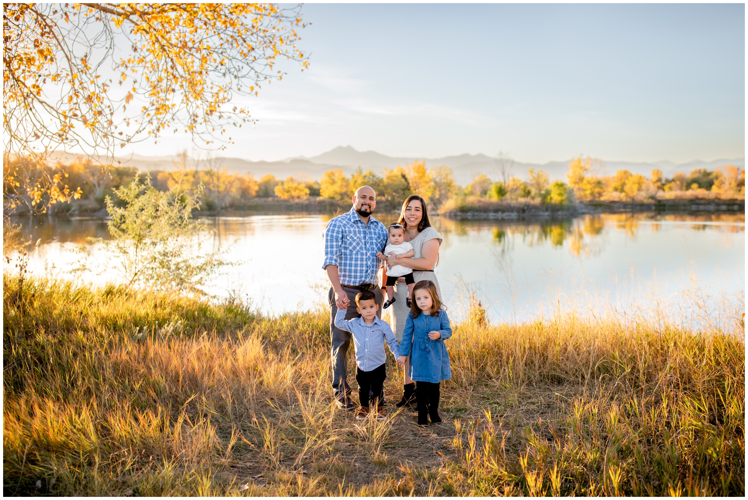 sunny fall family photos in front of a mountain lake in Longmont Colorado 