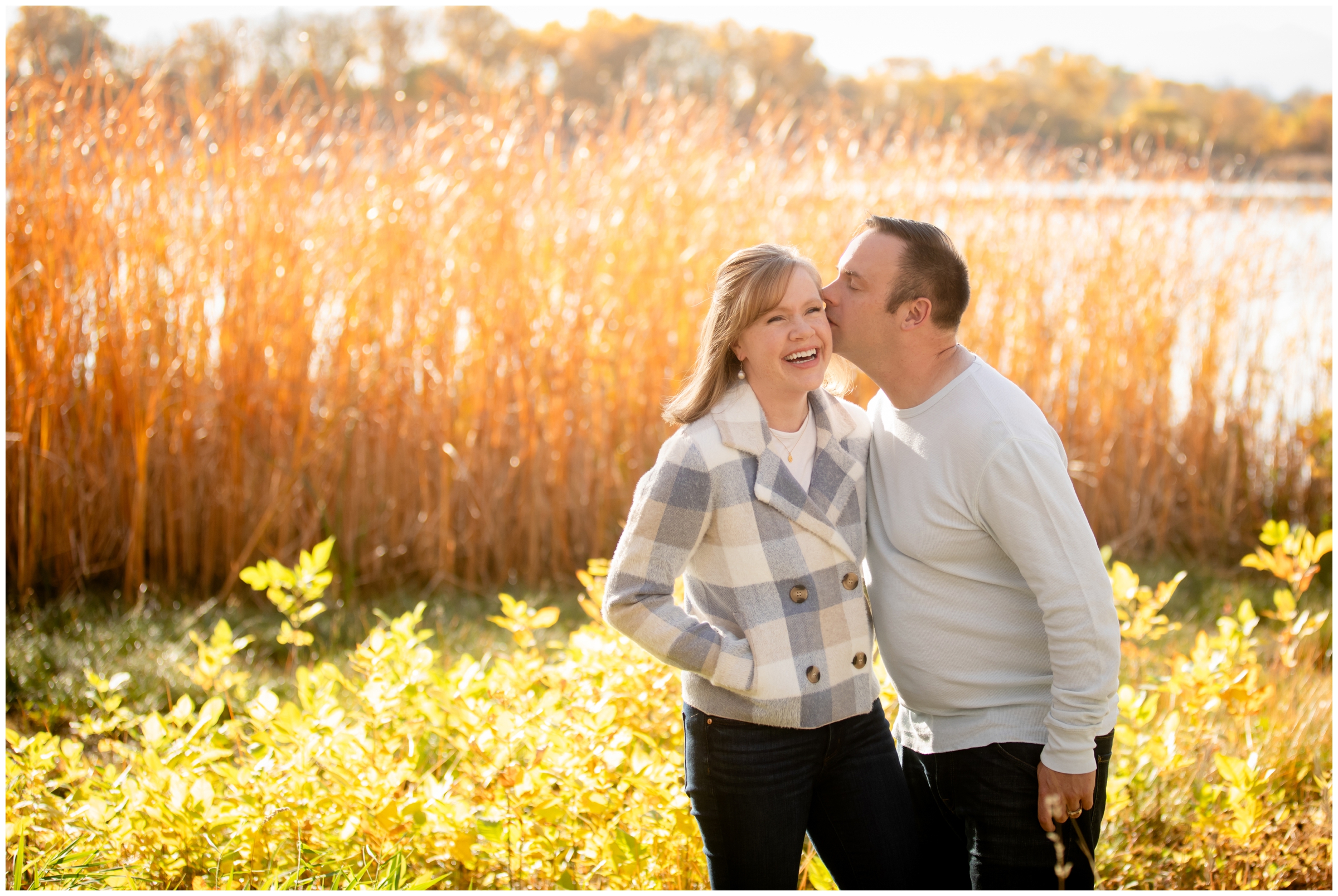 man kissing wife during couples photography session in northern Colorado during fall 