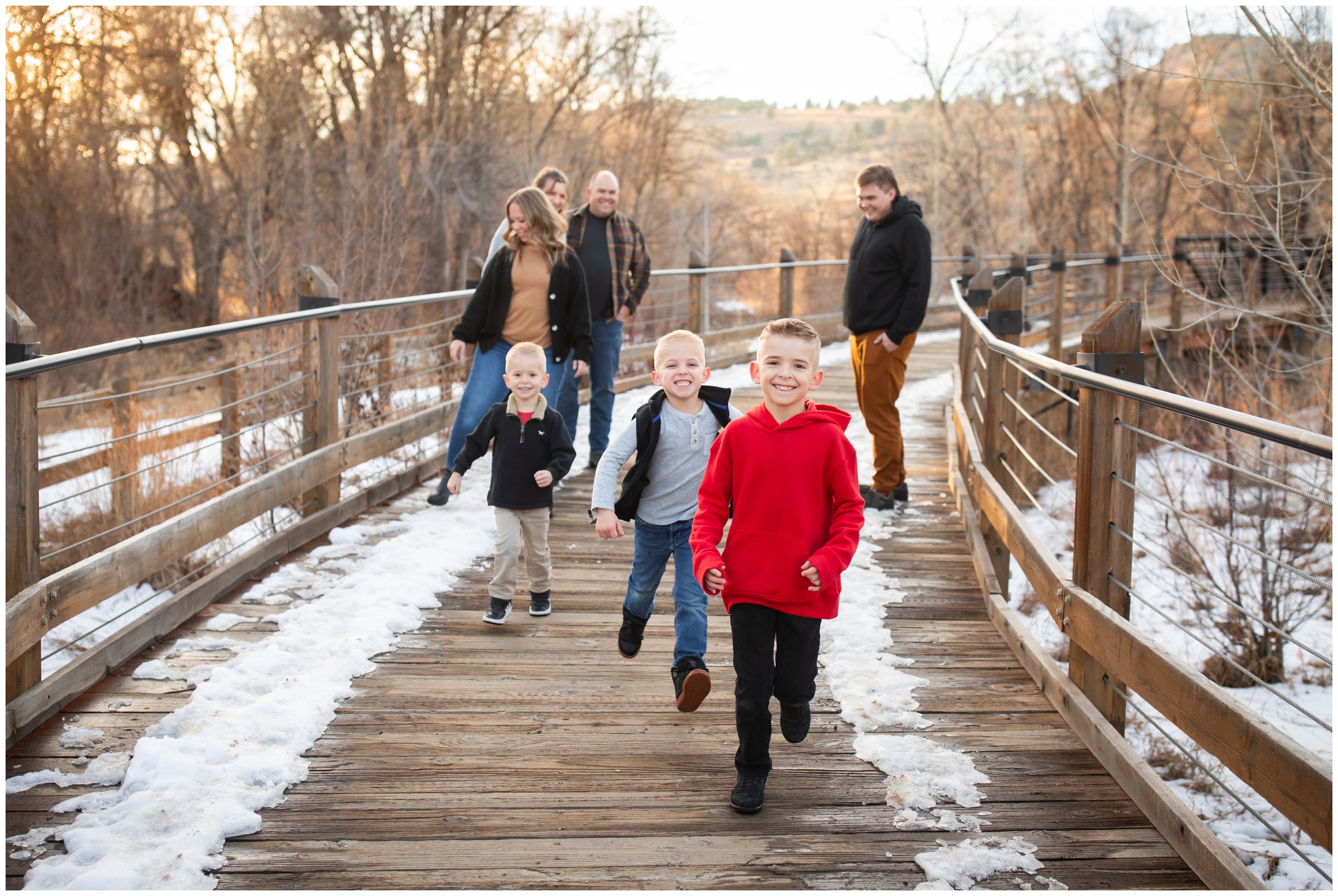kids racing during candid family photos in Lyons Colorado 
