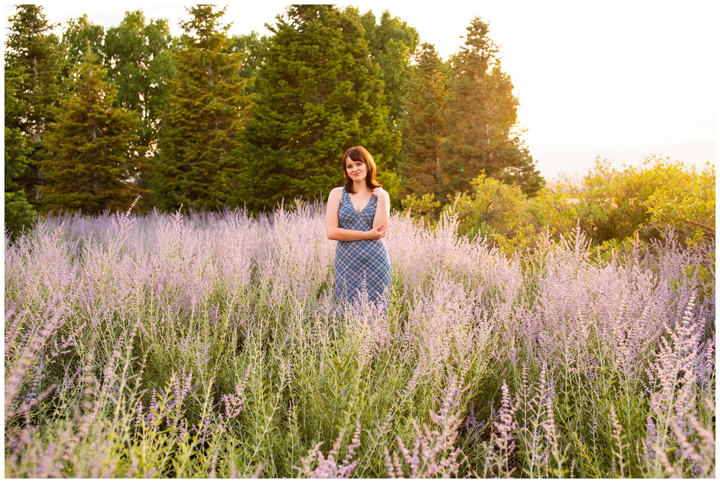 teen posing in lavender flower field during Broomfield Colorado photography session 