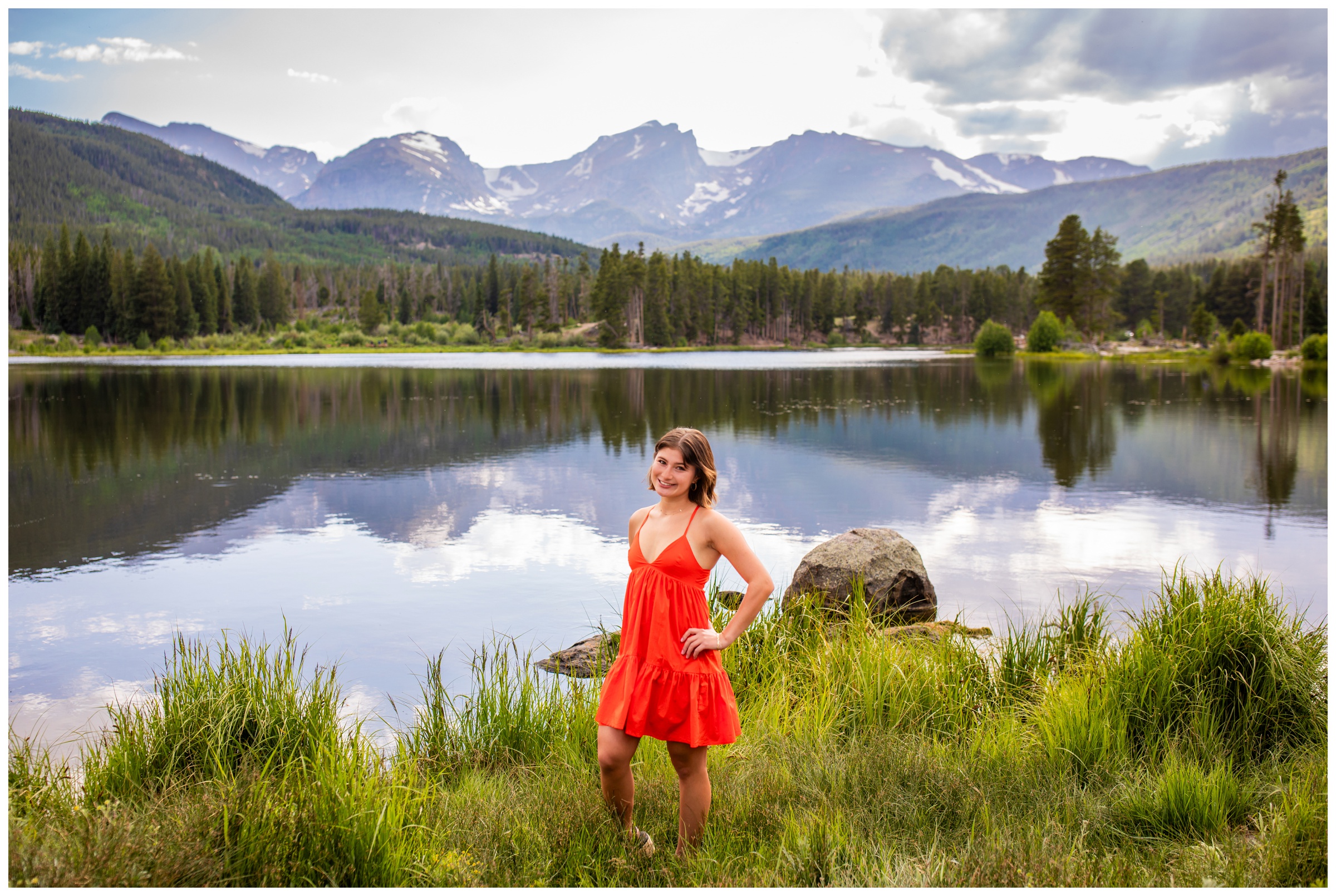 teen posing in front of Sprague lake during Estes Park portrait photography session by Plum Pretty Photography