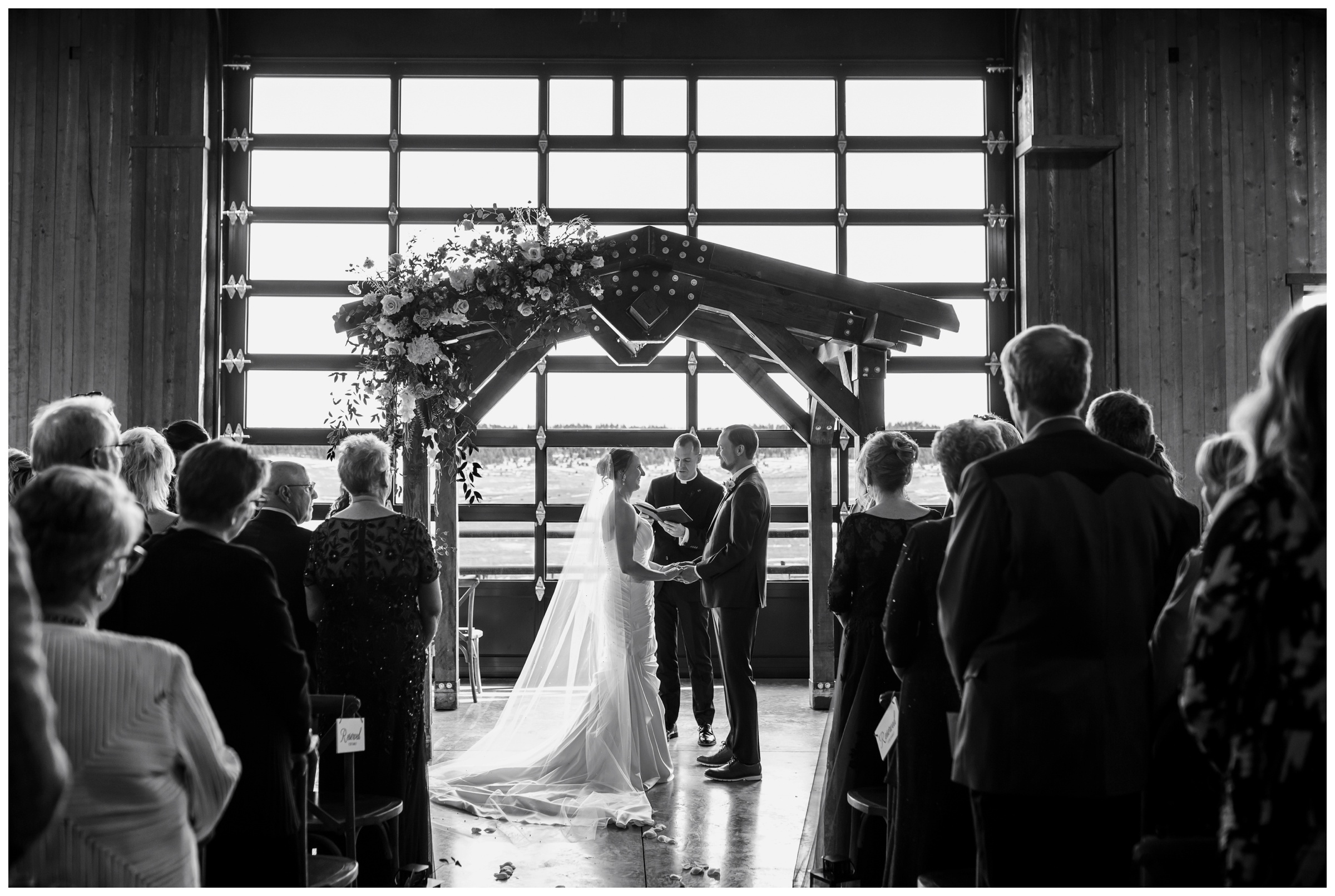 indoor wedding ceremony at the upper ranch at Spruce Mountain Ranch in Larkspur Colorado 