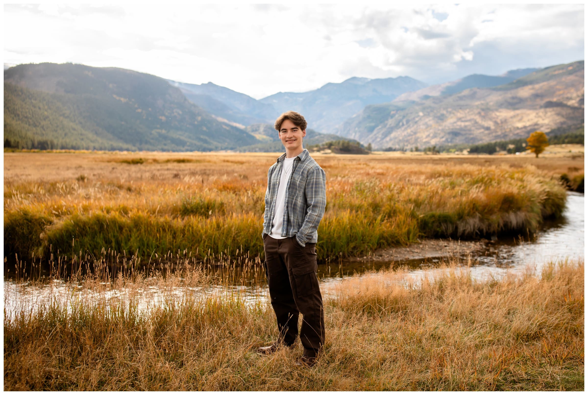 teen posing by the river in RMNP during Estes Park Colorado mountain senior pictures 