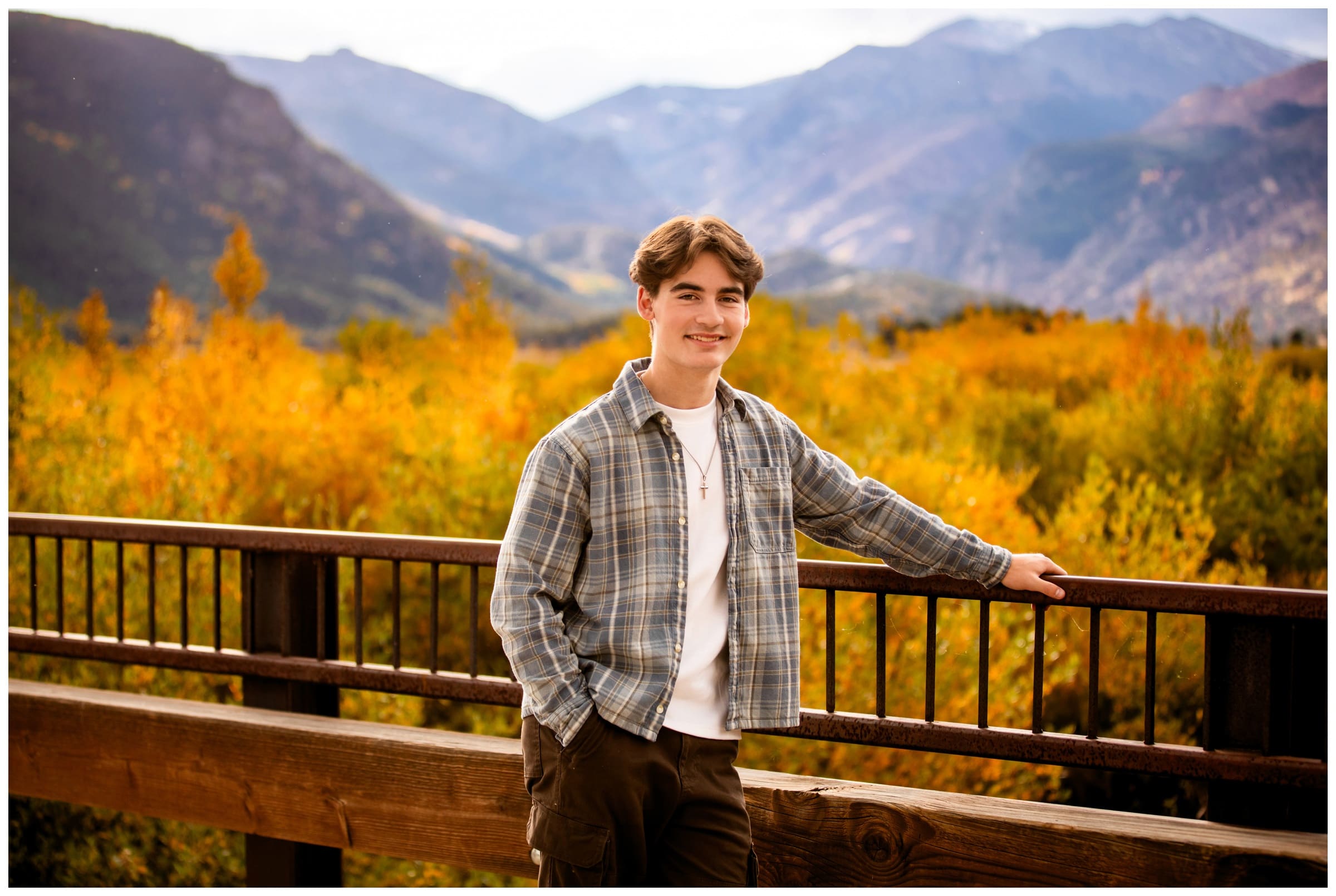 teen posing on bridge in RMNP during Estes Park Colorado mountain senior portraits 