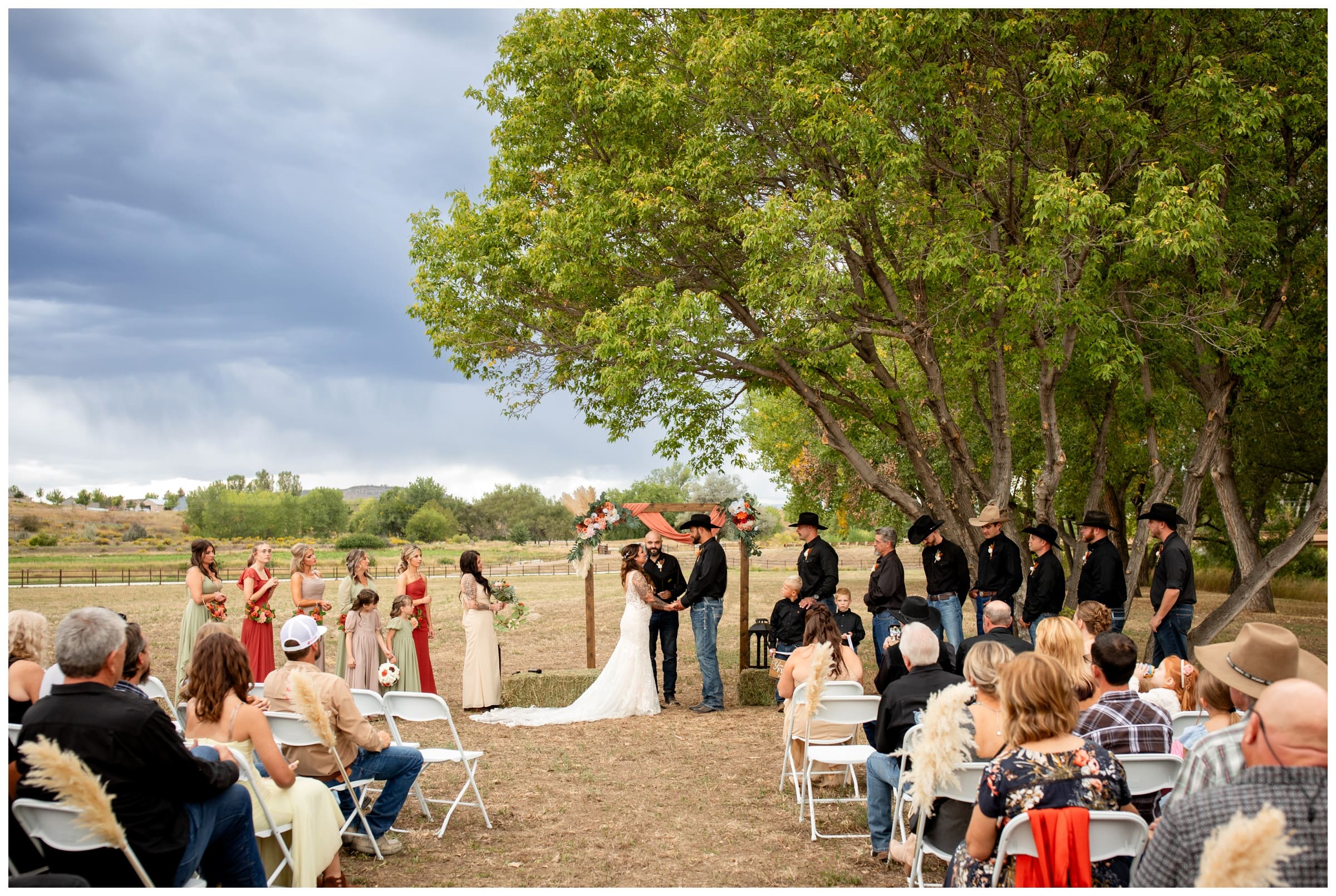 fall wedding ceremony on a rustic farm in Longmont Colorado 